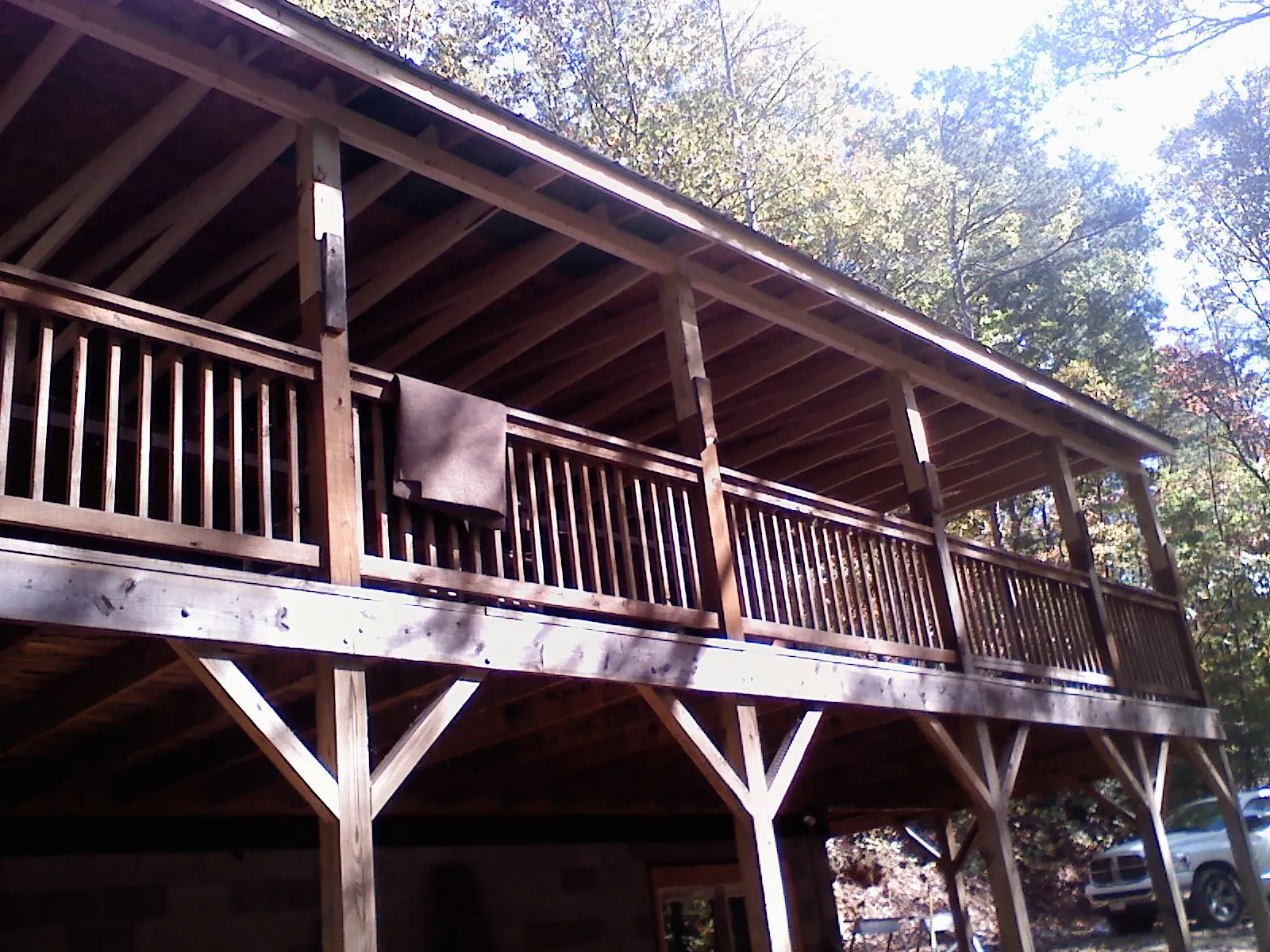 Timber framing under a new elevated porch and deck — Roof Leak Repair in East Montpelier by Roofing Brothers